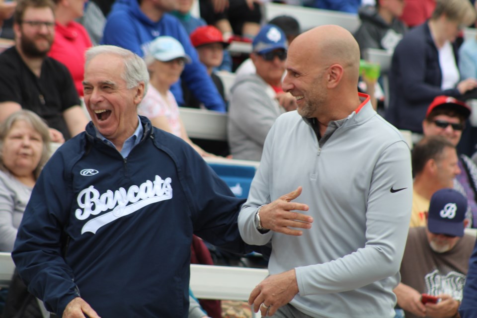 Barrie Baycats president David Mills, left, shares a laugh with ESPN's Dan Shulman during a visit to Barrie in May 2019. Raymond Bowe/BarrieToday