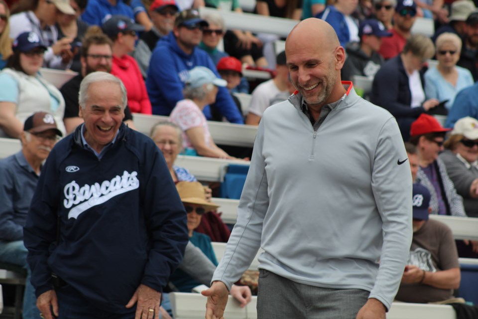 Barrie Baycats president David Mills, left, shares a laugh with ESPN's Dan Shulman, who was on hand to throw out the ceremonial first pitch between Barrie and the Kitchener Panthers during Intercounty Baseball League action on May 18, 2019 at Coates Stadium. Shulman was on hand to call the game with his son, Ben. Raymond Bowe/BarrieToday