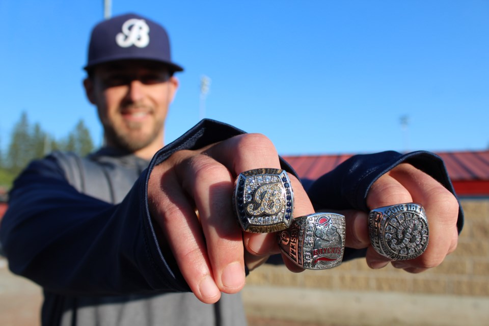 Barrie Baycats pitcher Brad Bissell with three of his Intercounty Baseball League championship rings. Raymond Bowe/BarrieToday