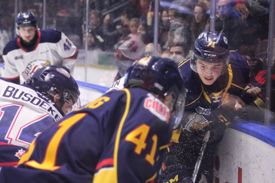 Members of the Barrie Colts and the Saginaw Spirit battle for a loose puck in the corner during OHL action at Sadlon Arena on Thursday, Feb. 20, 2020. Raymond Bowe/BarrieToday