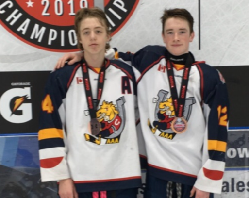 Nick Lamont (right) and Cameron Mercer are shown at the 2019 'AAA' OMHA Championships in Oakville where they won bronze medals. 