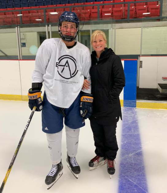 Barrie Colts forward Beau Jelsma is shown with his mother, Penny, who trained at the Mariposa School of Skating.