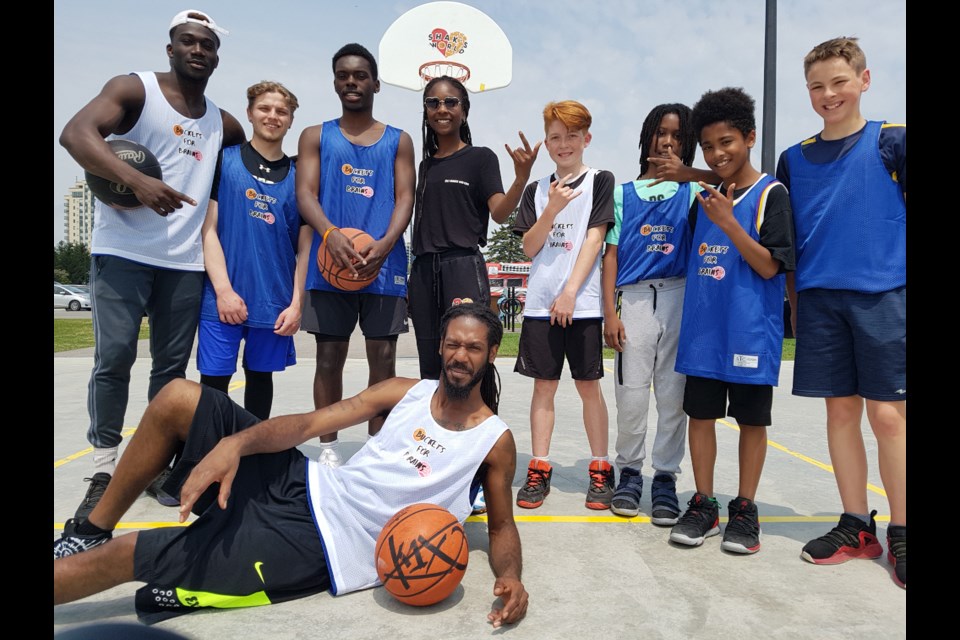 Shak Edwards (middle, underneath basket) hopes to grow Shak's World in the community and help in the fight for improved mental health, June 1 2019. Shawn Gibson/BarrieToday