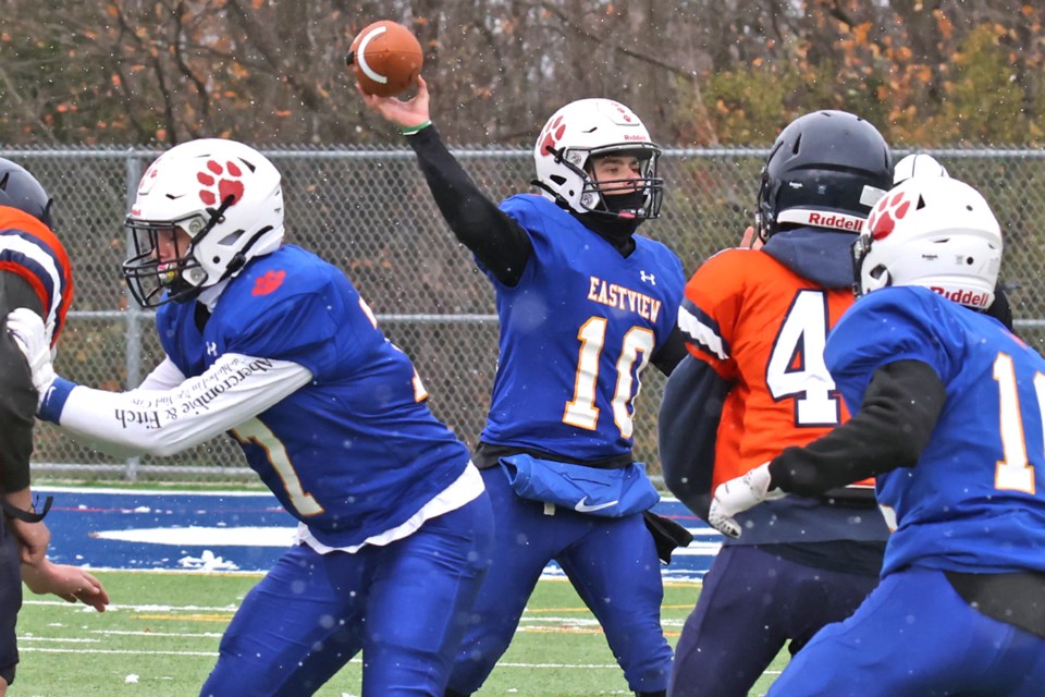 Eastview quarterback Hudson Young hurls a pass during SCAA senior football action on Wednesday afternoon against the Innisdale Invaders at Georgian College's J.C. Massie Field in Barrie.  Eastview won, 13-8.
