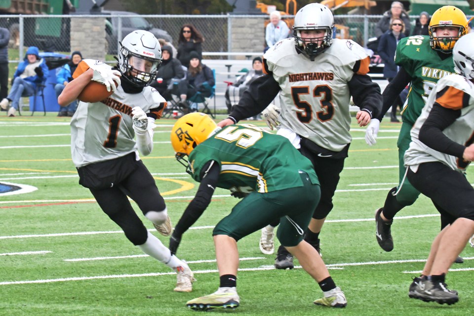 Noah Buckindale of the Orillia Nighthawks looks for an opening during their SCAA semifinal game against the Barrie North Vikings at J.C. Massie Field in Barrie on Monday. The Vikings won 22-6.