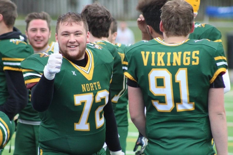 Joe Gabor of the Barrie North Vikings senior football team was already all smiles and thumbs up at halftime, leading 43-0, en route to a 50-1 win over the Collingwood Fighting Owls at J.C. Massie Field in Barrie on Friday. Raymond Bowe/BarrieToday