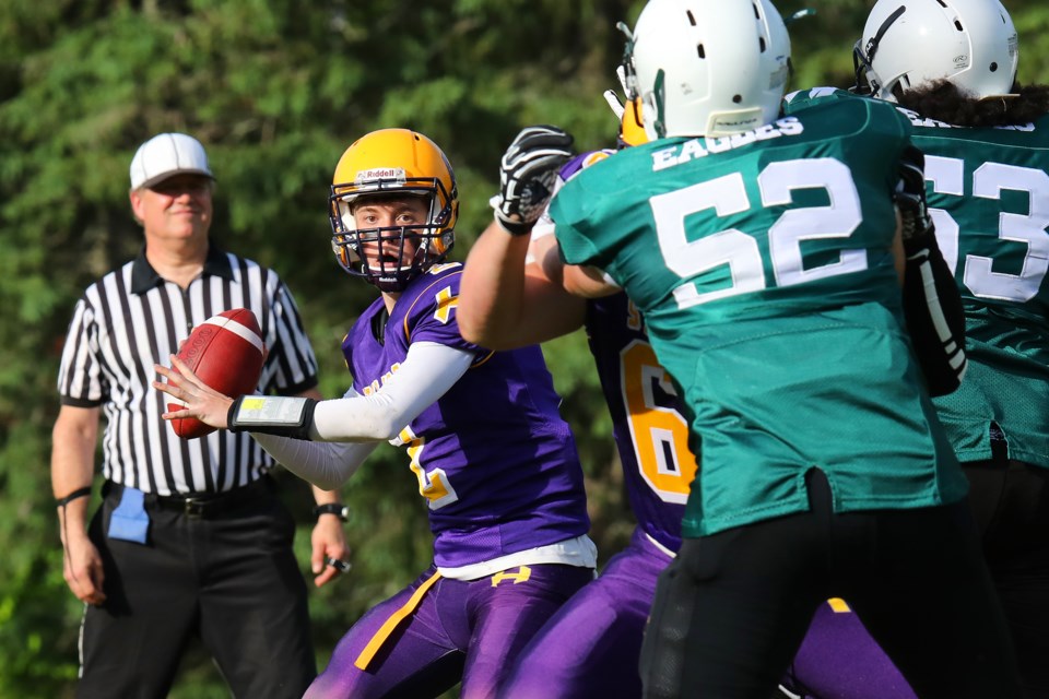 Justin Winn looks for a reciever during the Huronia Stallions varsity game against the Etobicoke Eagles at the Barrie Sports Complex in Midhurst. The Eagles won 16-3. Kevin Lamb for BarrieToday.