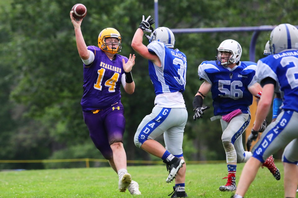 Zach Patfield of the Varsity Huronia Stallions looks for a receiver as they took on the Sudbury Gladiators at the Barrie Sports Complex on Saturday, June 23, 2018. Kevin Lamb for BarrieToday.