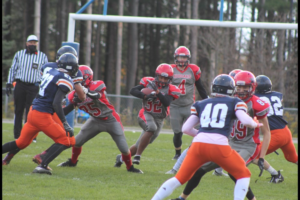 Johnny Forbes of the Bear Creek Kodiaks looks for a hole in the defence during the SCAA semifinal against the Innisdale Invaders on Thursday, Nov. 4, 2021.  The Kodiaks won, 19-7.
