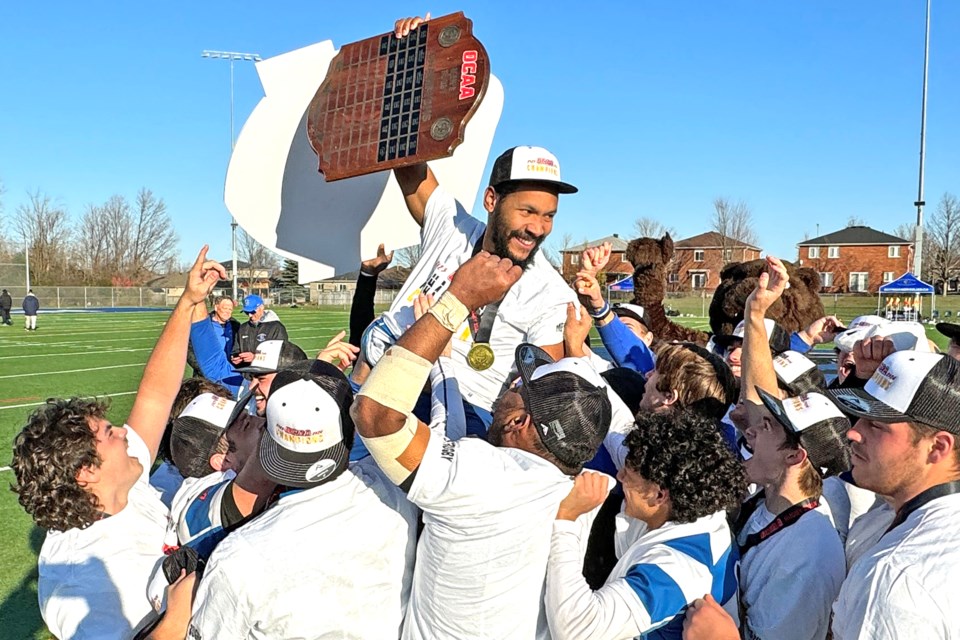 The Georgian Grizzlies celebrate after winning the 2023 Ontario Colleges Athletic Association (OCAA) men’s rugby championship gold medal match against the Humber Hawks at J.C. Massie Field in Barrie on Sunday afternoon. They beat the Hawks 26-10.