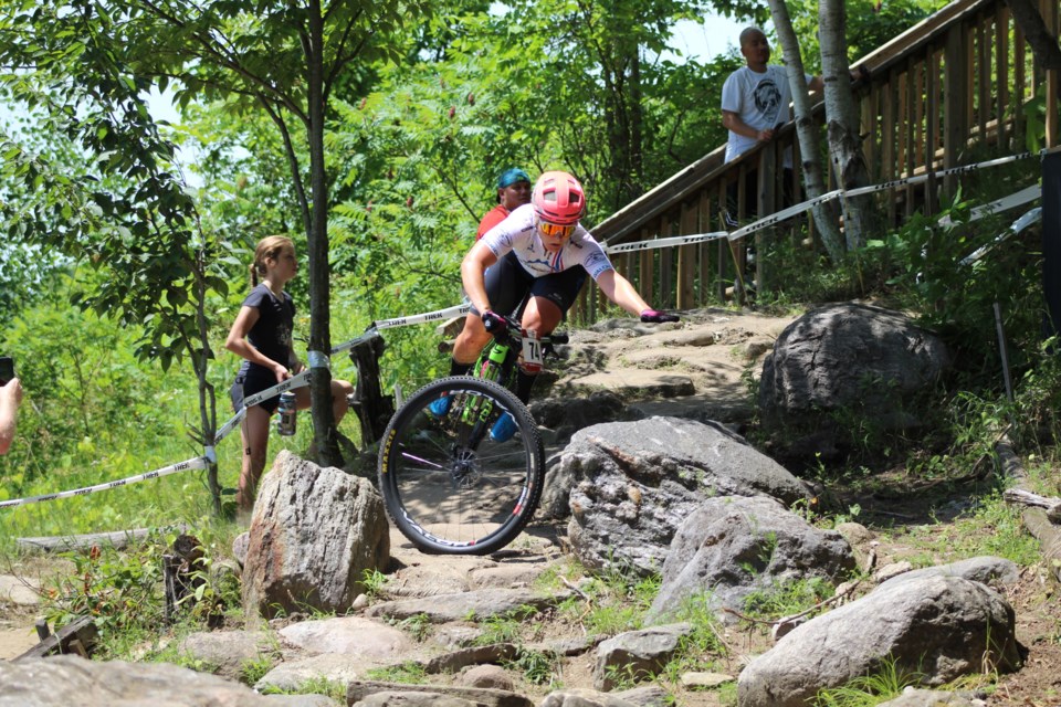 A rider takes a heavy fall on the boneshaker. Hardwood Ski and Bike, located south of Orillia in Oro-Medonte Township, hosted the 2019 Canadian XCO MTB Championships on Saturday, July 20, 2019. Raymond Bowe/BarrieToday