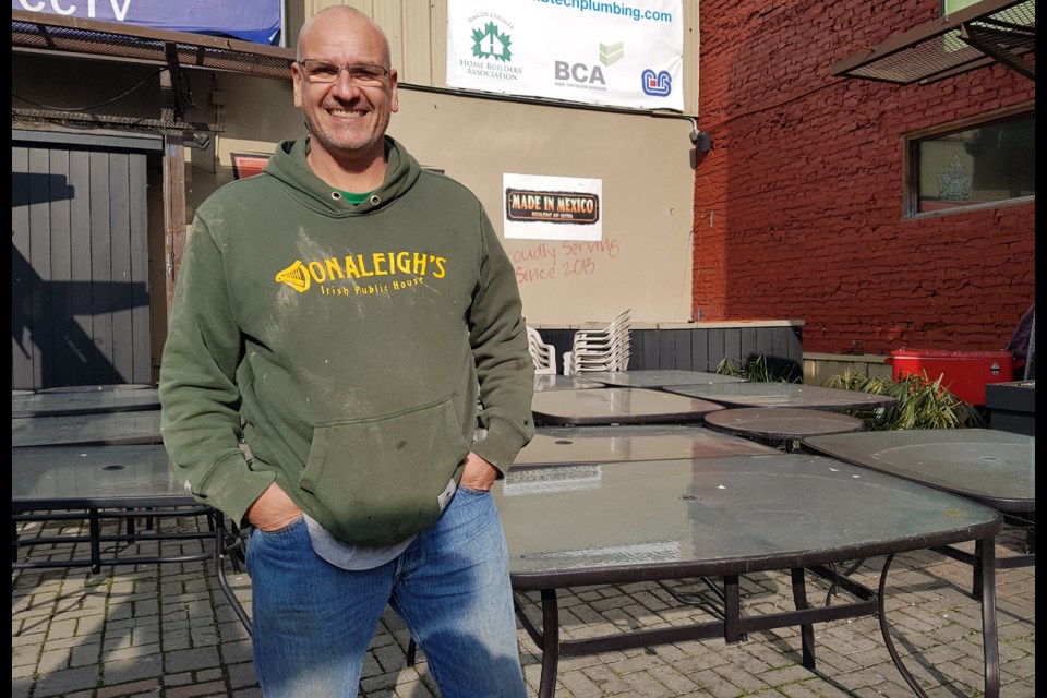 Steve Ricalis stands on the patio at 10 Dunlop St. E., where a new Nashville-themed restaurant will open in early 2020. Shawn Gibson/BarrieToday