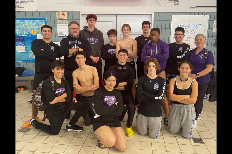 Members of the St. Peter's Catholic Secondary School swim team pose for a photo. 