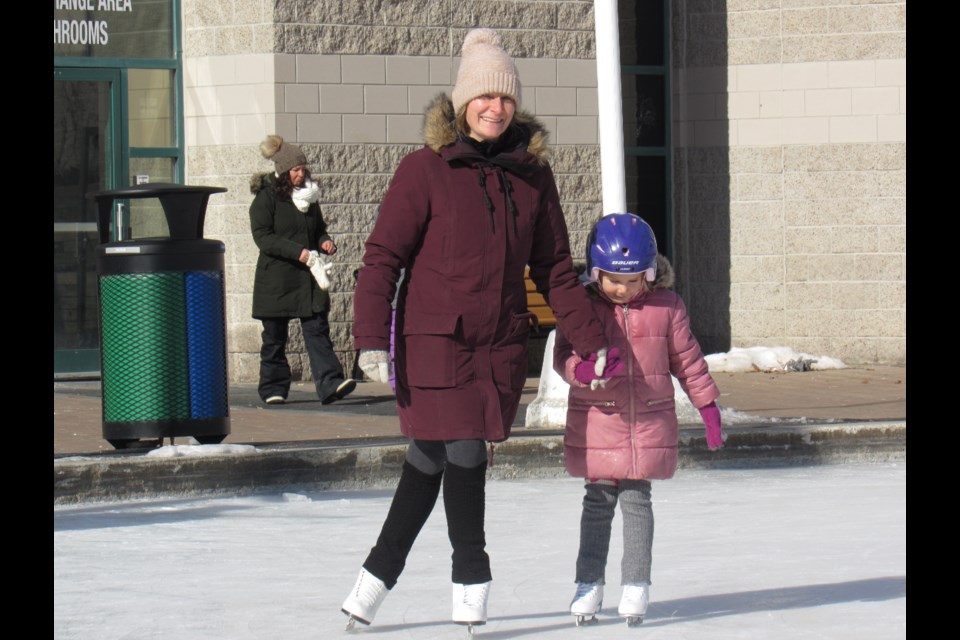 Tammy Groot and her daughter enjoy the mommy/daughter skating time at Circle at the Centre on Wednesday at Barrie City Hall. Shawn Gibson/BarrieToday