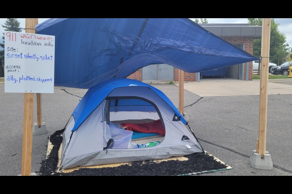 Outreach services were given a demonstration by Barrie fire of how to keep those living in tents safe and how to be found when needed, Tuesday, July 12, 2022.