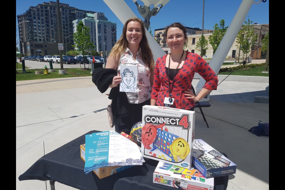 Megan Hooper (left) and Sherry O'Leary are at Meridian Place in downtown Barrie every Tuesday and Thursday for TGIT. Shawn Gibson/BarrieToday