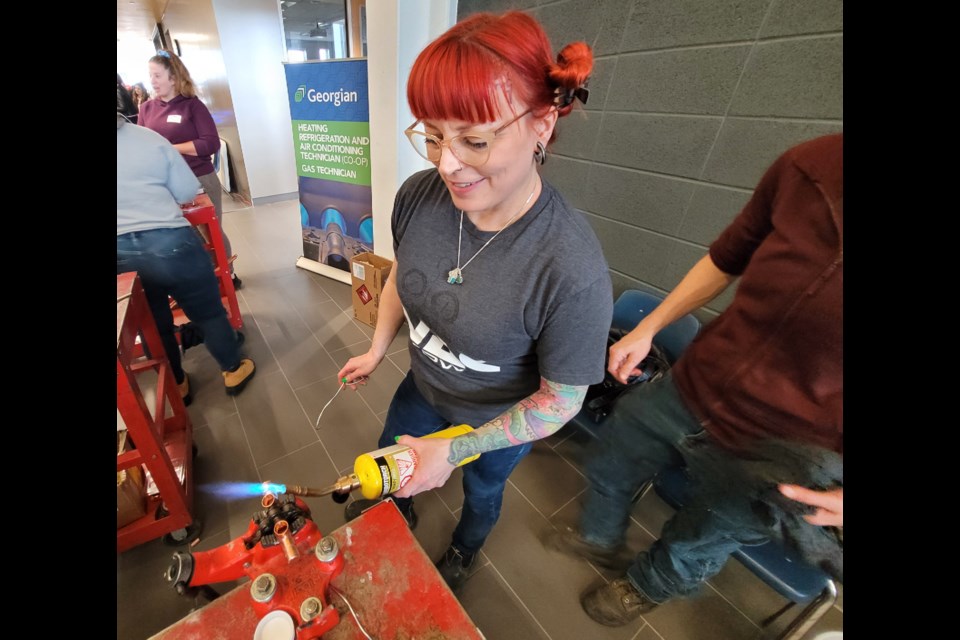 Brandi Ferenc brought her 18 years of skilled trades experience to Georgian College's open house information event Saturday.