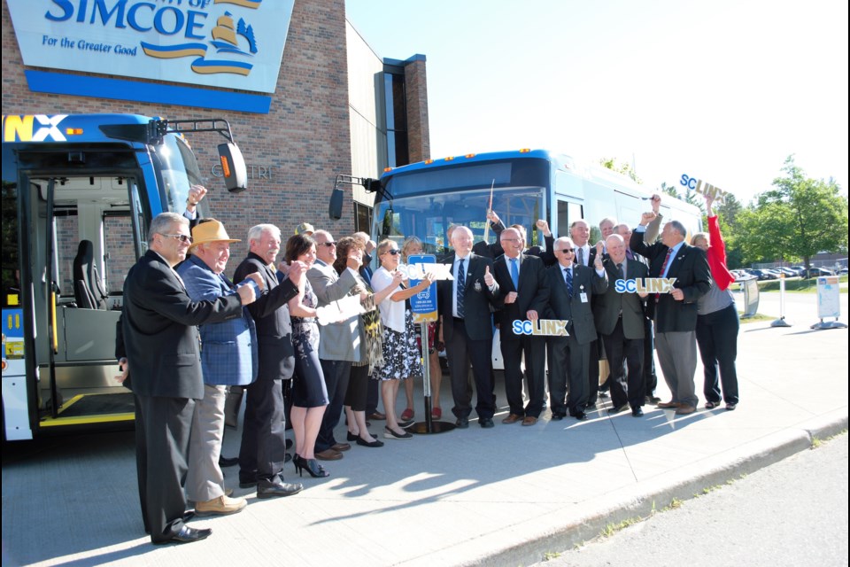 County councillors celebrate the unveiling of the new buses for the Simcoe County Transit LINX. Jessica Owen/ BarrieToday