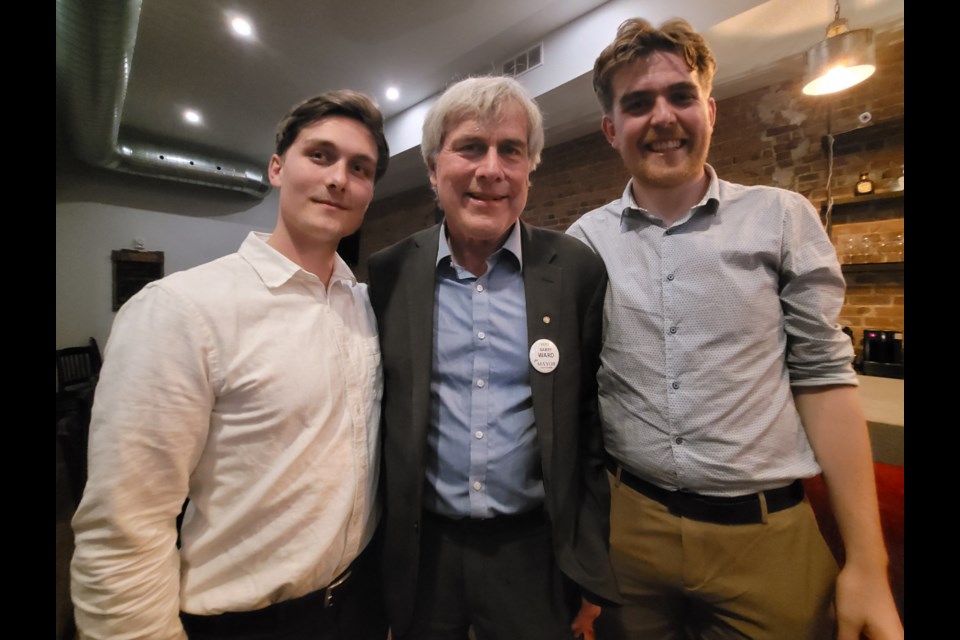 Barry Ward is flanked by his sons, Oliver (left) and Julian after conceding defeat to Alex Nuttall in the 2022 Barrie mayor's race Monday night.