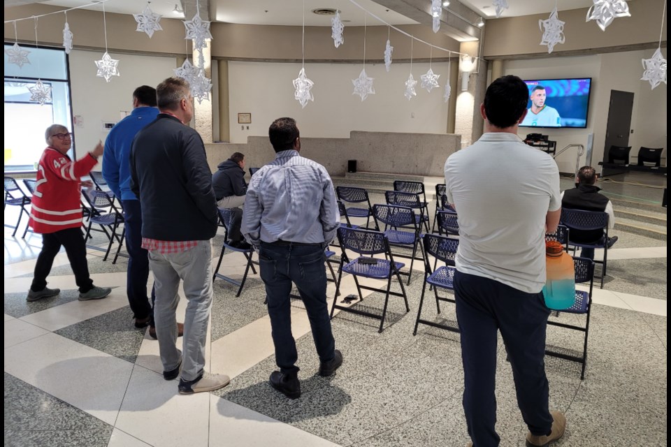 Canada fans watch the minutes die down on Canada's 2022 World Cup involvement, Thursday, and now await 2026, when the team tries again. This morning's game was televised in the Barrie City Hall Rotunda.