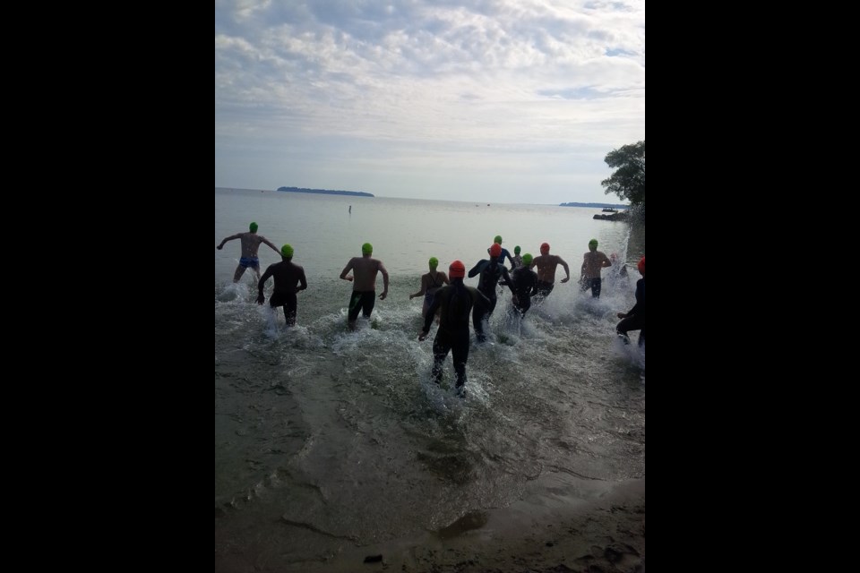 Swimmers hit the waters of Lake Simcoe in the open water competition. Photo submitted by Ian Feldman.