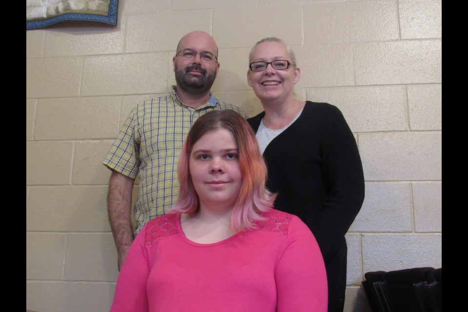 Abby Lelievre (middle) will be cheered this Saturday at the Simcoe Rising Star 2018 gala by mom Aimee Allen (right) and step-dad Mike Allen (left). Shawn Gibson for BarrieToday