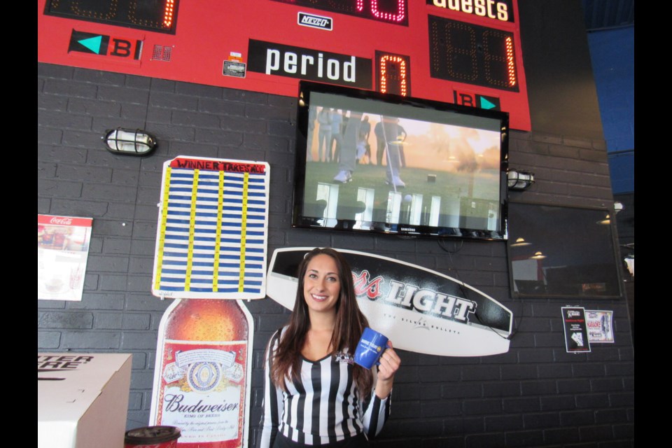The Penalty Box server Miranda Franconeri coffee's up for another great day at The Penalty Box!
photo credit Shawn Gibson                                 