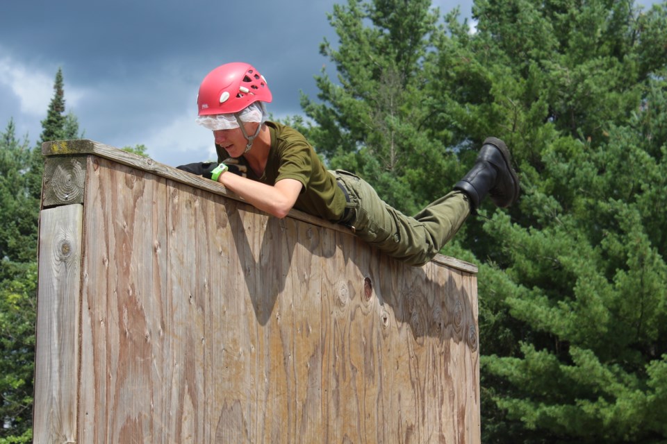 Mick Oliver, a 12-year-old cadet from Clinton, Ont., scales a wall on the obstacle course at the Blackdown Cadet Training Centre.
Robin MacLennan/BarrieToday