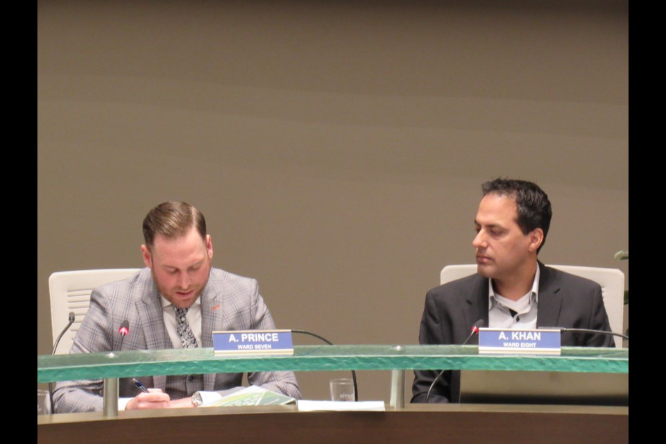 Councillor Arif Khan (right) watches on as Councillor Andrew Prince talks about the 2018 budget
Shawn Gibson for Barrie Today                               