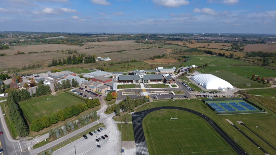 1. Aerial view of The Country Day School's 100-acre campus