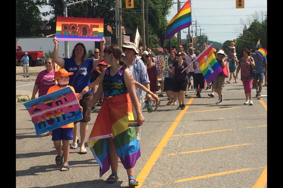 Over 600 people from across the province walked side by side during North Bay's first Pride March.