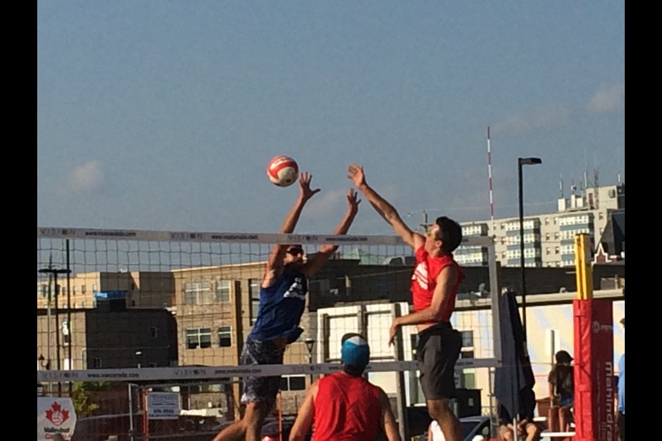 Garrett May and Maverick Hatch battle for senior men's National beach volleyball title 