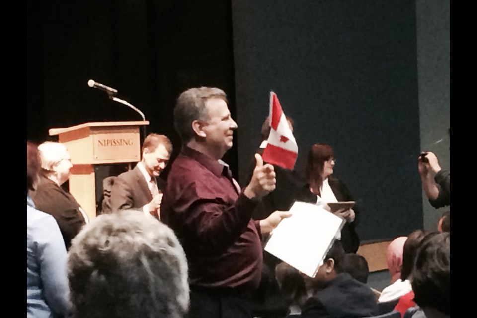 Celebrating becoming a Canadian Citizen at Citizenship Ceremony in North Bay