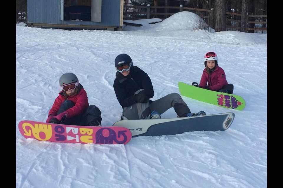 Natalie, mom Megan and Sadie Wague prepare for an afternoon of snowboarding at Laurentian Ski HIll