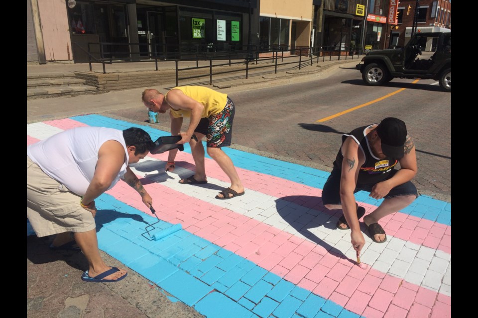 North Bay Pride paints trans flag on courtesy walk as lead up to Pide week activities