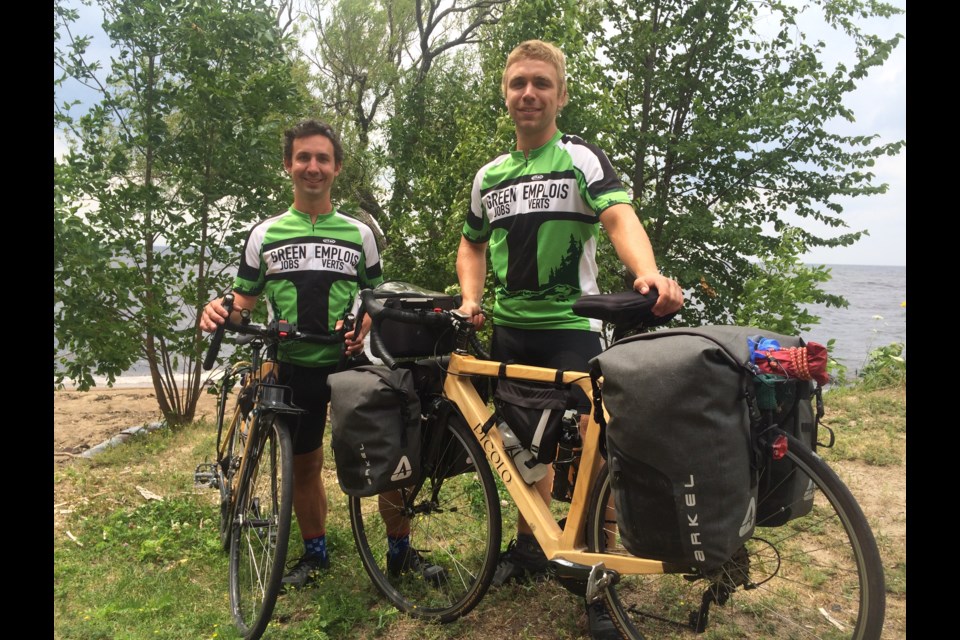 (l-r) Nick and Zac Wagman arrive in North Bay riding wooden bicycles as part of their Project Learning Tree's Green Ride
