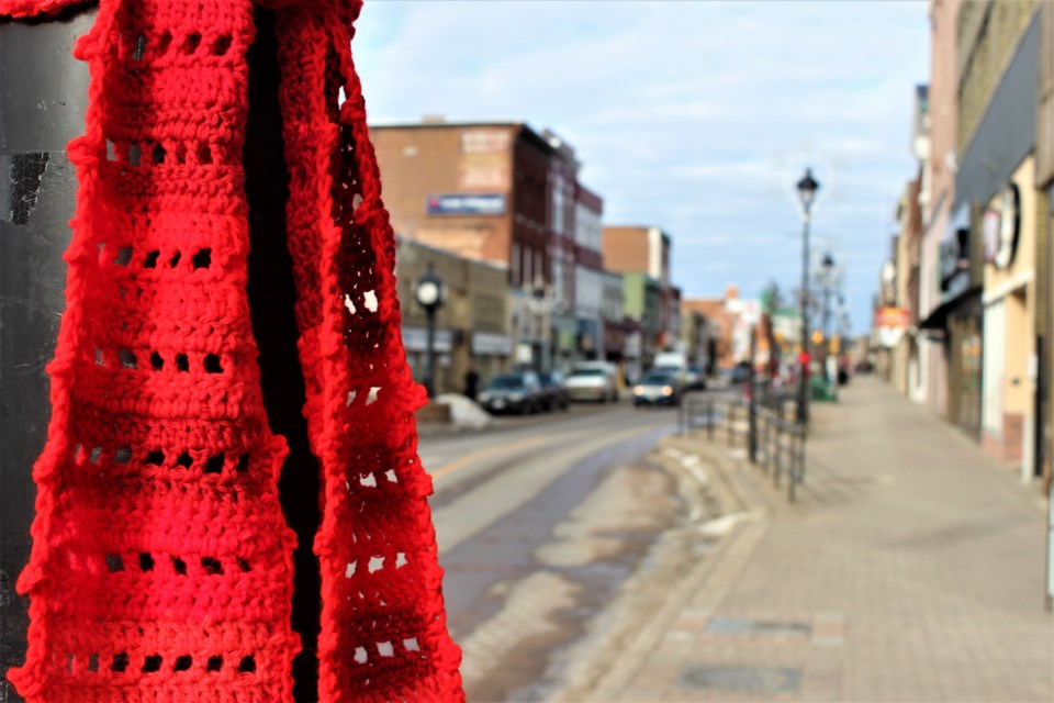 You'll notice the downtown is covered in red, as scarves have been tied to almost everything that they can be tied to. Photo by Ryen Veldhuis.
