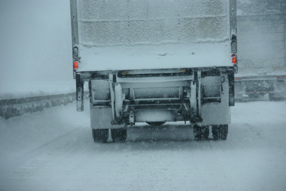 blizzard highway trucks AdobeStock_123594348  2016