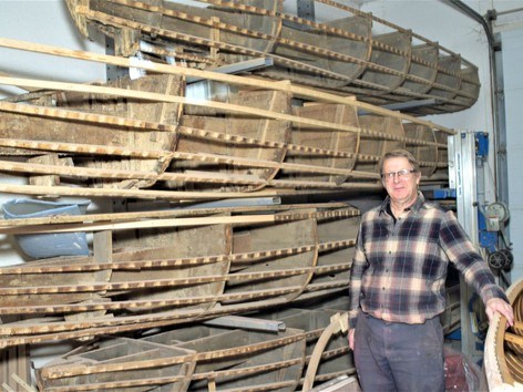 Current Giesler Boats owner Gerry Giesler pictured with the various moulds the company uses to make its fishing boats. The wood mould on top is the one his grandfather used in 1927 when he made his first fishing boat. The mould is still in use today. (Rocco Frangione photo)