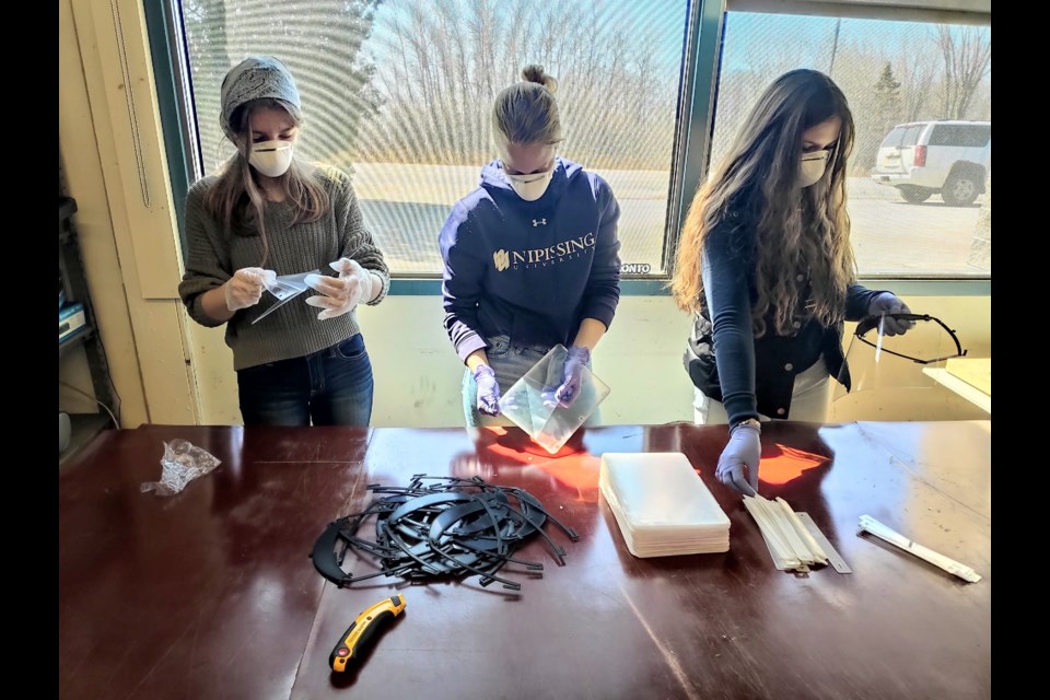 Assembling KNIGHT Shield masks in the Knecht family workshop. supplied.