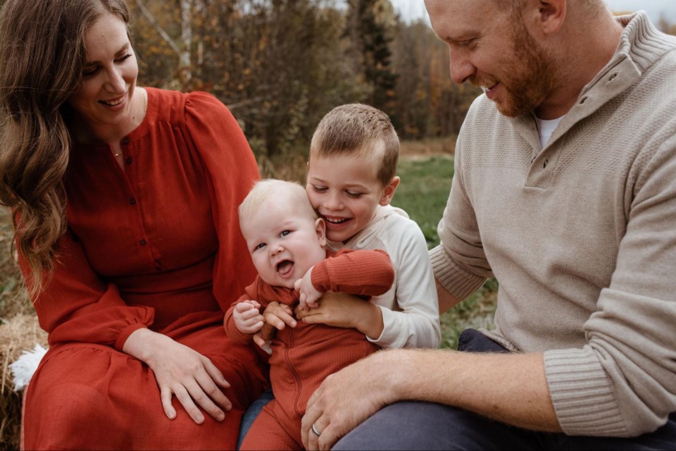 Kate Merritt-Dupelle (left) and family. Photo by Black Saddle Photography. 