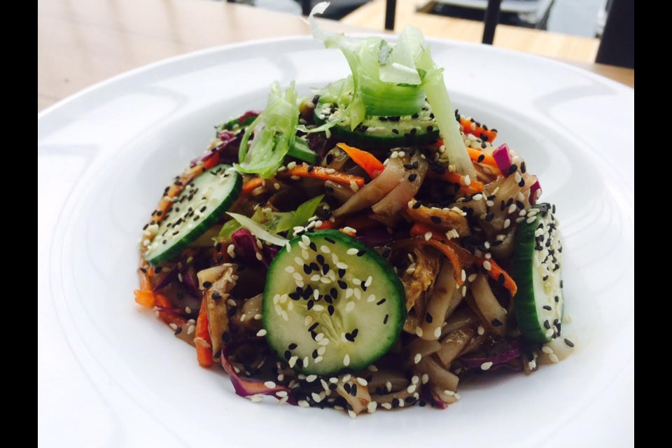 Duck wings with Asian noodle salad