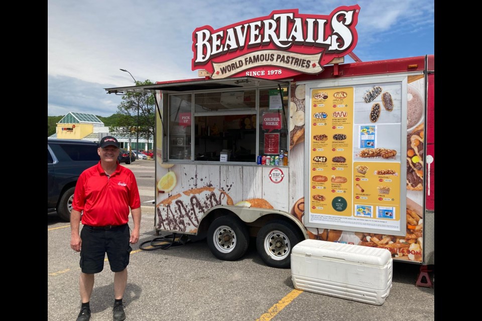 Ray Seguin outside his Beaver Tails mobile in North Bay. Photo by Matthew Sookram.