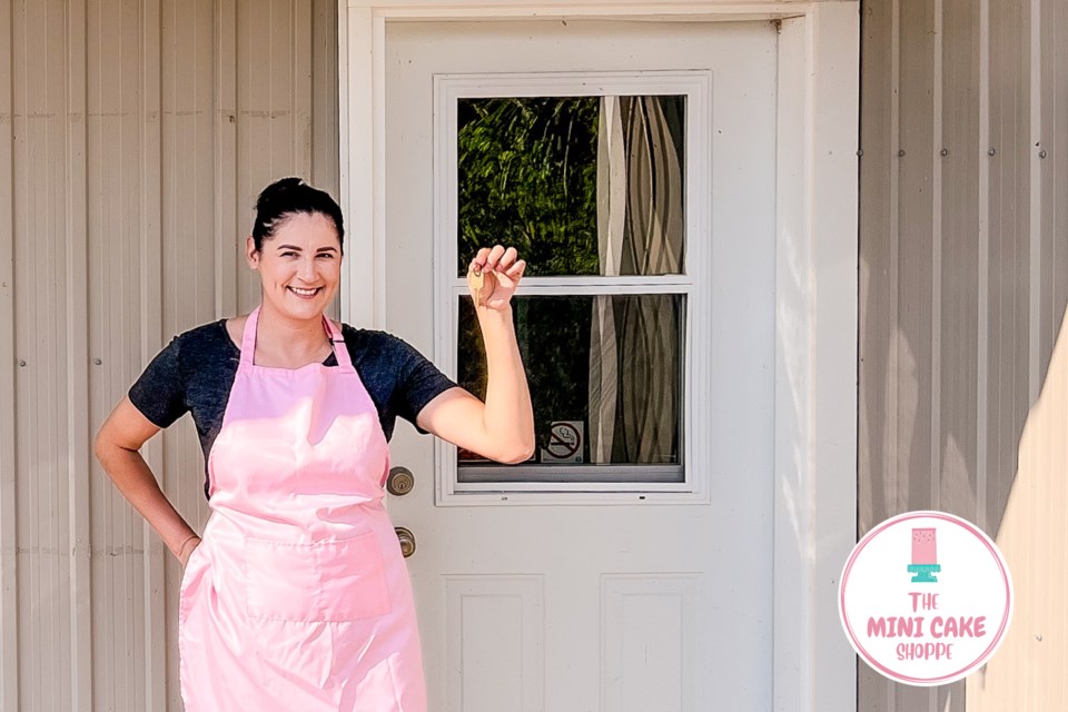 Holly Couchie with the keys to her new bakery on Main Street in Callandar. Photo provided by Holly Couchie. 