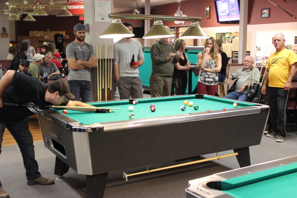 Young, old, guy, or gal, Partners has brought people together through their pool leagues. Photo by Ryen Veldhuis.