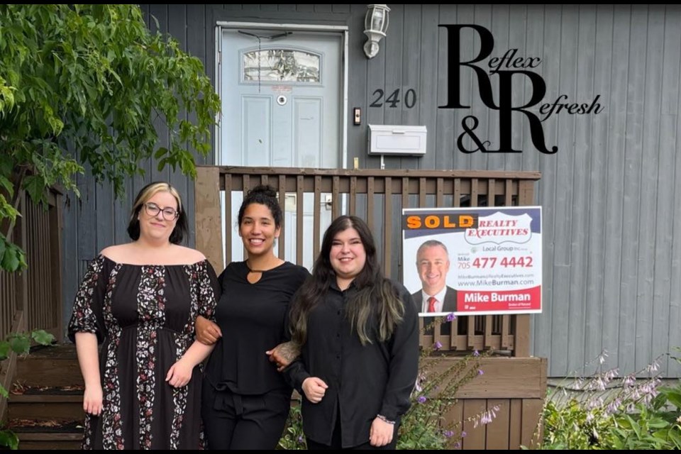 The Reflex and Refresh team outside their new building at 240 1st Avenue West. From left to right Darby Mckie, Asheena Tilbury, Kayla Tabensky. Photo provided by Asheena Tilbury. 