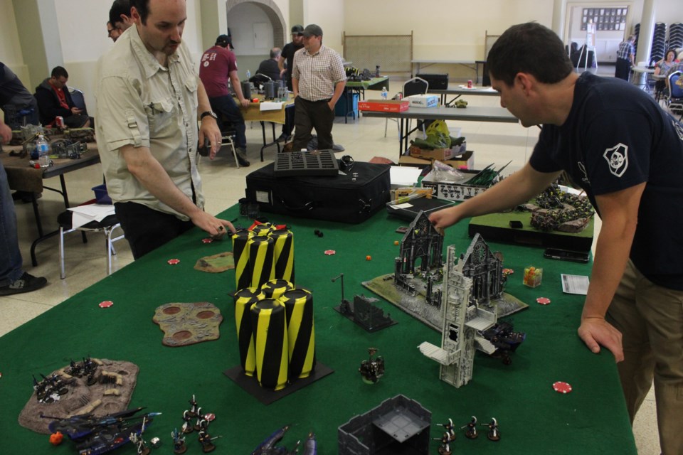 Warhammer 40,000 is a miniature war game usually playedby two players with dozens of minis. Photo by Ryen Veldhuis.