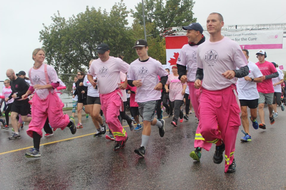 Around 200 participants braved the rain on Sunday to support the Canadian Breast Cancer Foundation CIBC Run for the Cure. Photo by Ryen Veldhuis. 
