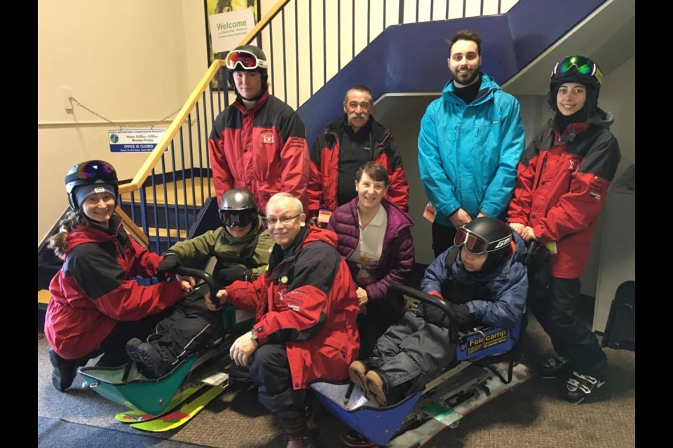 Marilyn Korzekwa with the North Bay Trackers.  She
spent a day skiing with them last February and saw first hand the amazing work that they do. Supplied. 