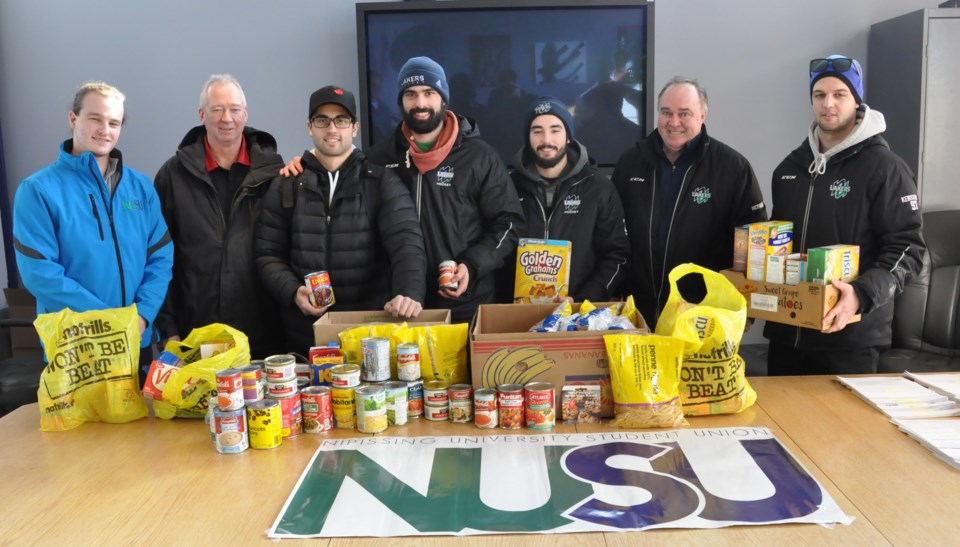 nipissing lakers donate to food bank 2016